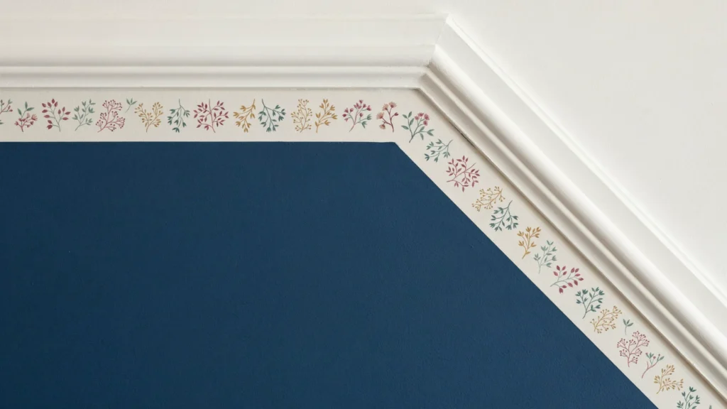 How can you add a decorative wallpaper border